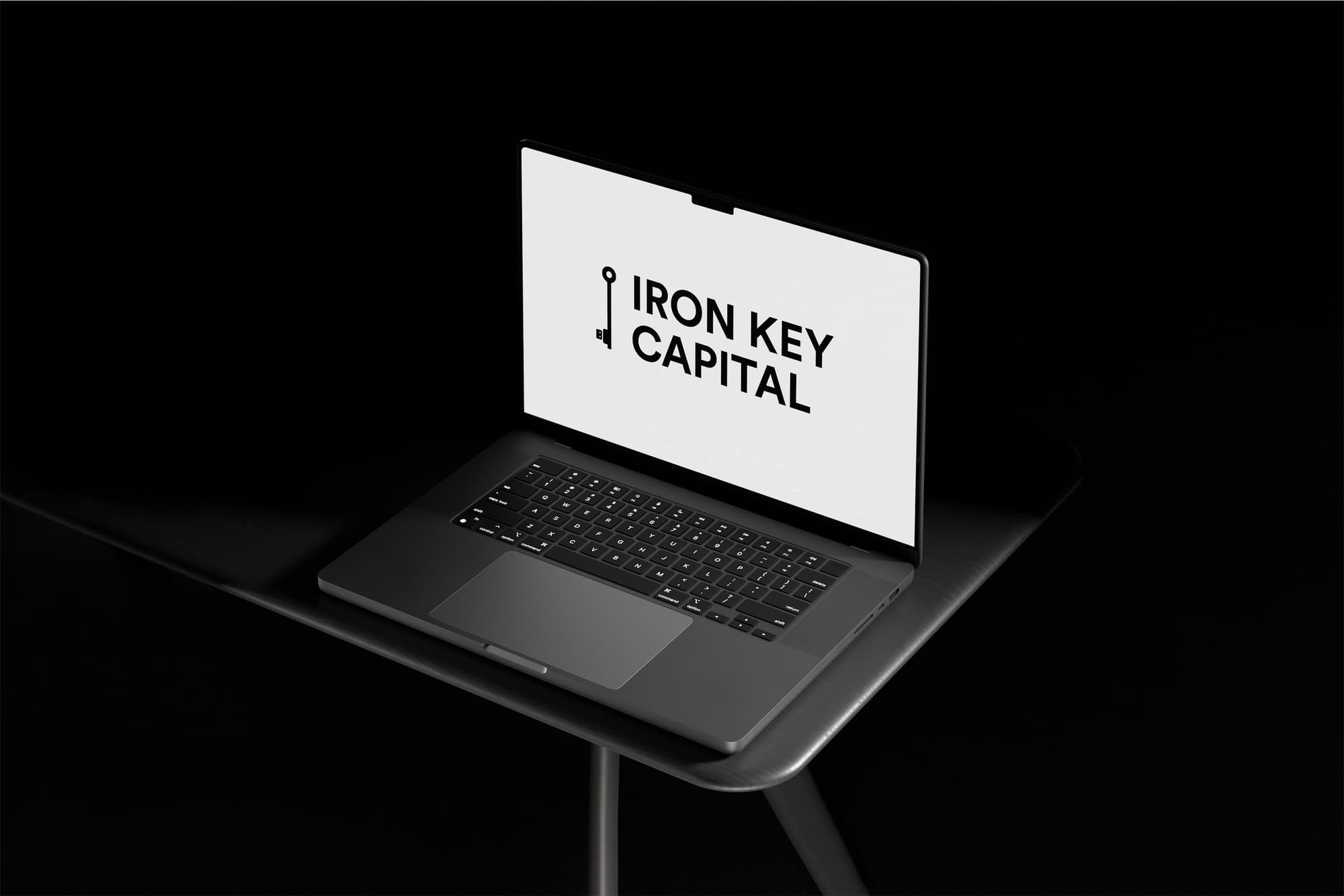 Iron Key Capital brand system on laptop, business card and phone mockups