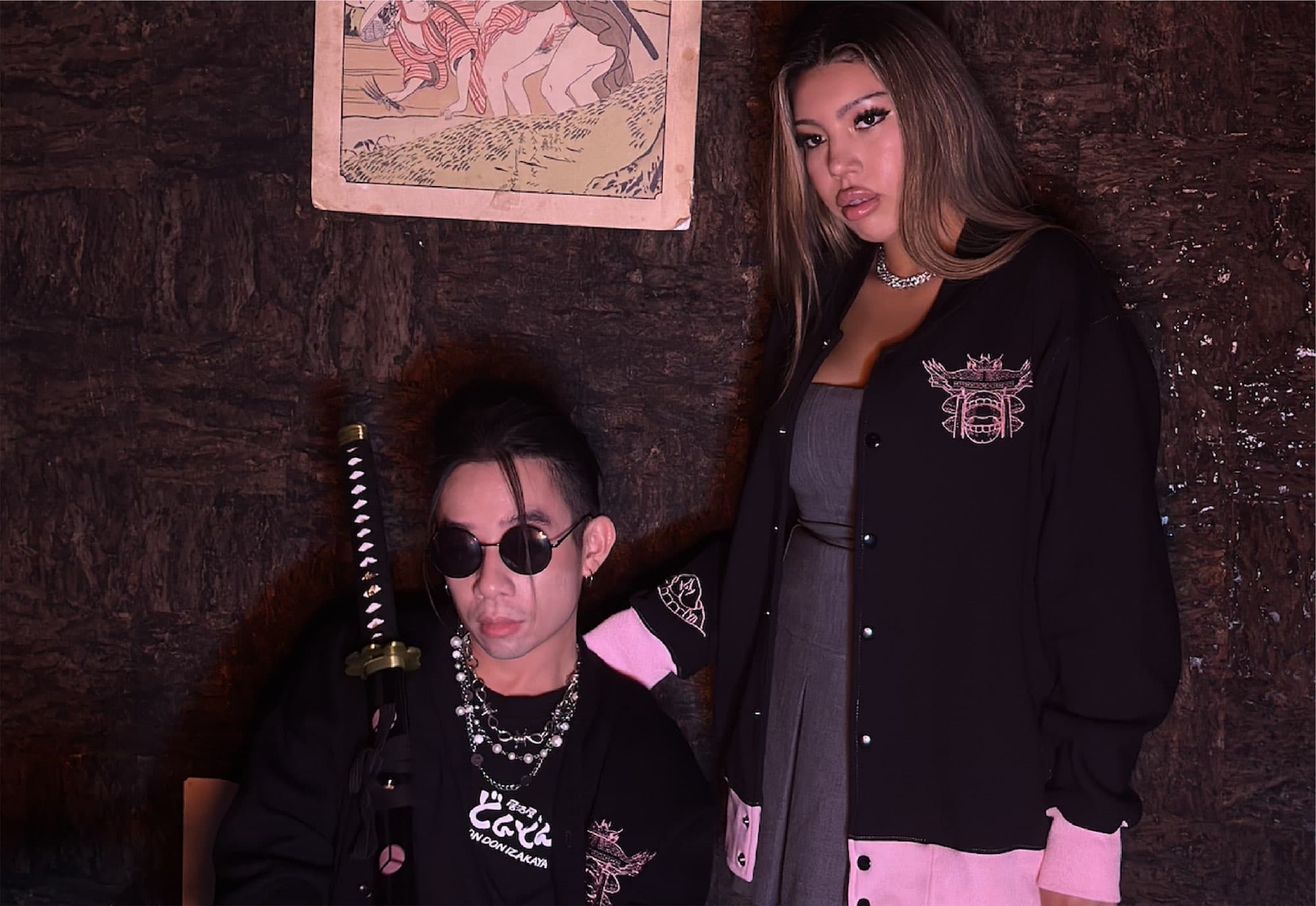 KotoKuru models in brand jackets on the izakaya shoot set