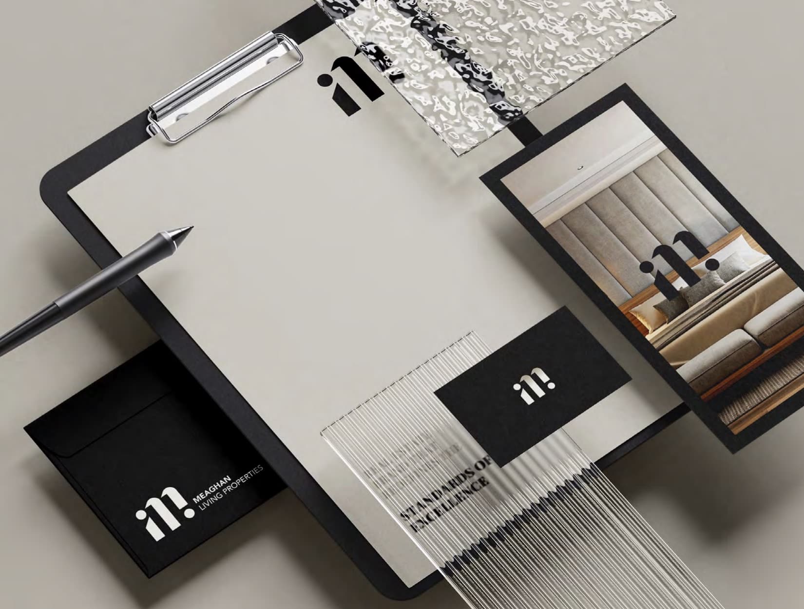 Meaghan Living Properties stationery and phone mockups on onyx